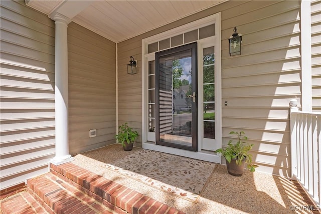 entrance to property with covered porch
