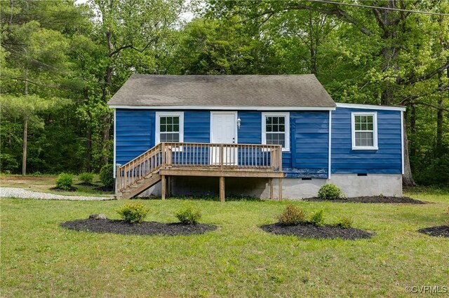 view of front facade featuring stairs, a wooden deck, a front yard, and crawl space