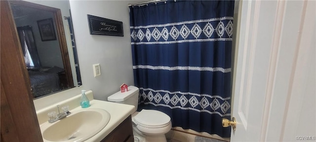 full bath with vanity, toilet, and a shower with shower curtain