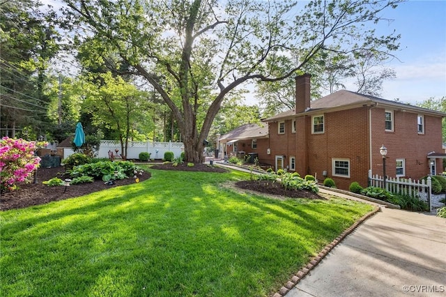 view of yard with fence