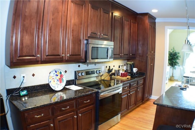 8313 Kalliope Ct, Chesterfield, VA 23838 - kitchen with stainless steel appliances, light wood finished floors, crown molding, hanging light fixtures, and dark stone counters