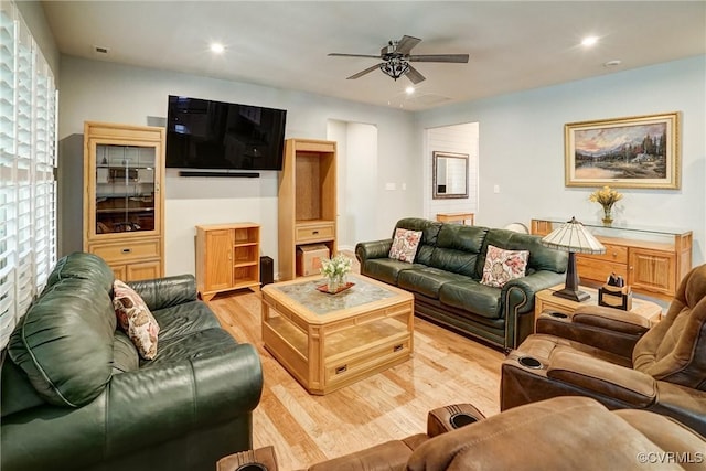 living area with ceiling fan, recessed lighting, and light wood-style flooring