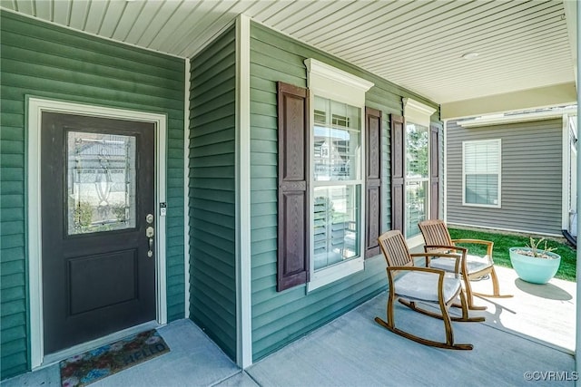 entrance to property with a porch