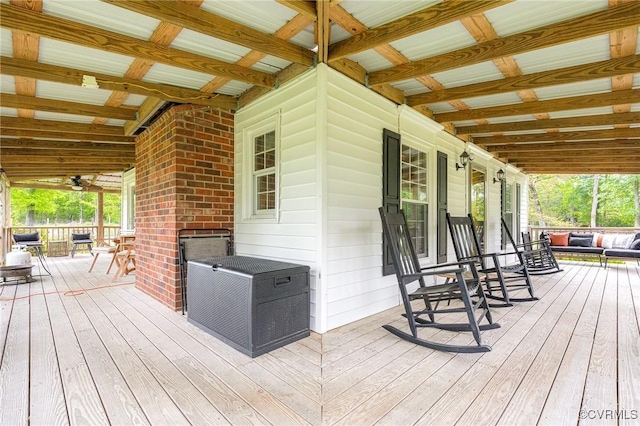 wooden deck featuring covered porch