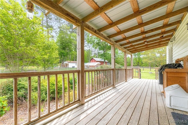 wooden deck featuring fence