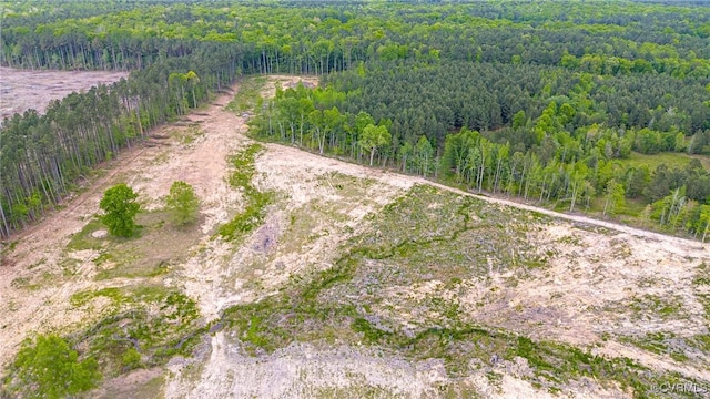aerial view featuring a view of trees