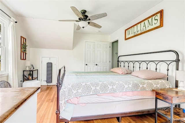 bedroom with wood finished floors