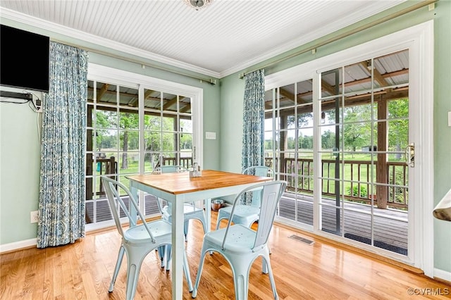 sunroom featuring visible vents