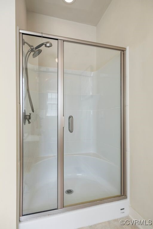 bathroom with a stall shower