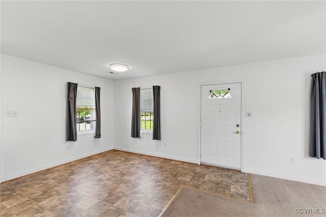 entrance foyer with baseboards