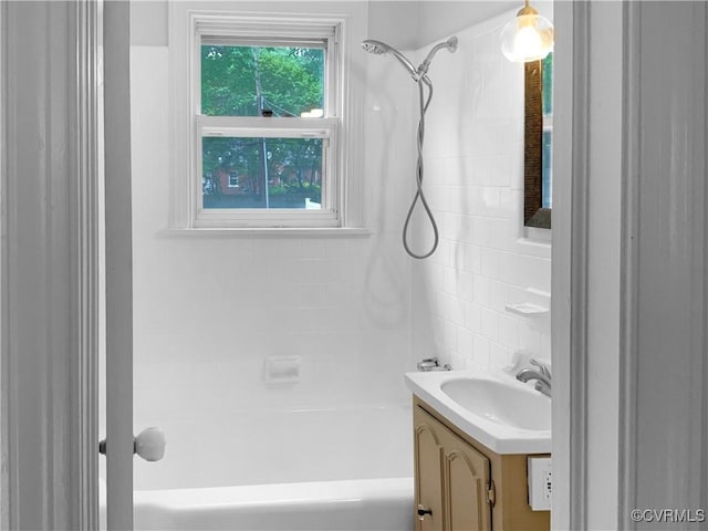 full bathroom featuring vanity and  shower combination