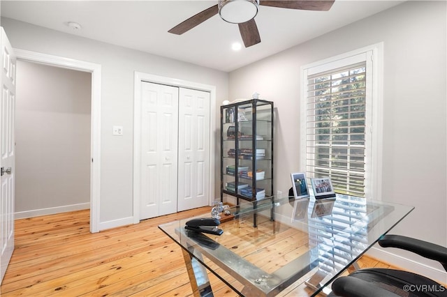 office area with light wood-style floors, recessed lighting, baseboards, and ceiling fan
