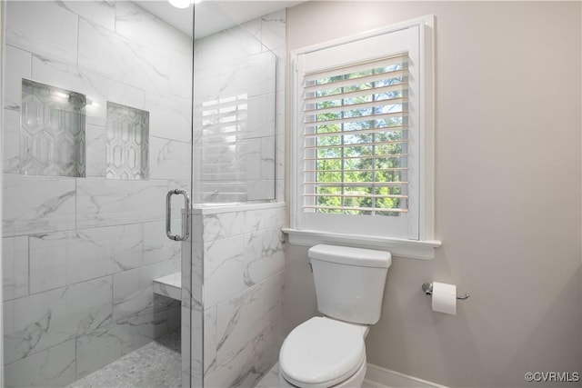 full bath with toilet and a marble finish shower