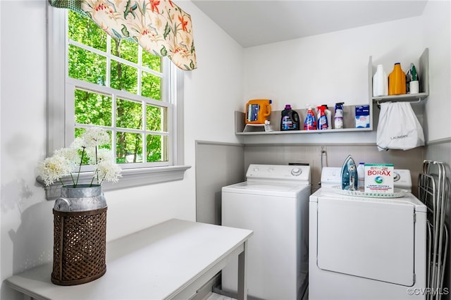 laundry area featuring independent washer and dryer and laundry area
