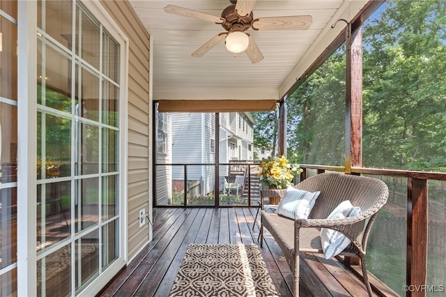 exterior space featuring a ceiling fan