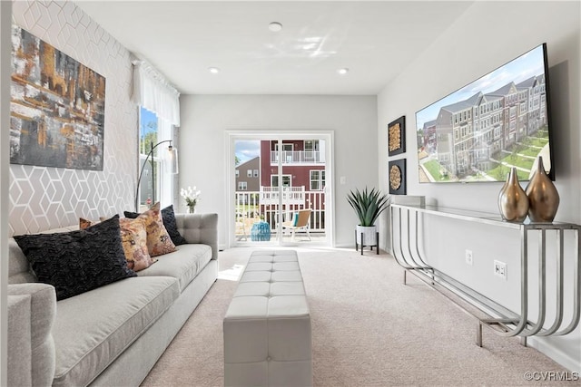 carpeted living area featuring recessed lighting