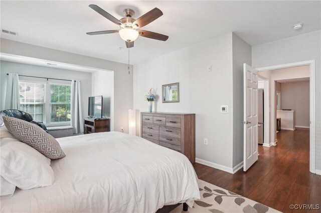 14000 Briars Cir Unit 202, Midlothian, VA 23114 - bedroom with visible vents, baseboards, ceiling fan, and wood finished floors