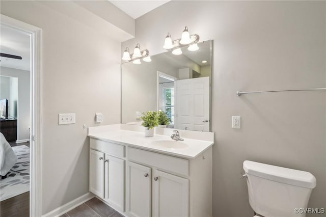 14000 Briars Cir Unit 202, Midlothian, VA 23114 - ensuite bathroom featuring ensuite bathroom, baseboards, toilet, and vanity