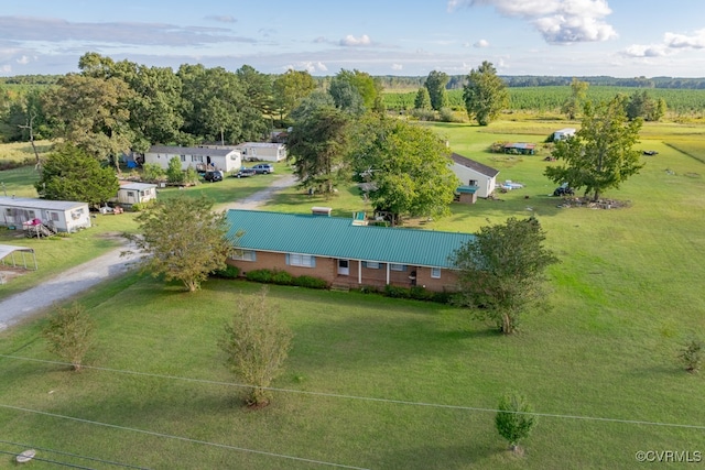 birds eye view of property featuring a rural view