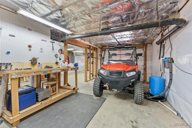 garage featuring a workshop area