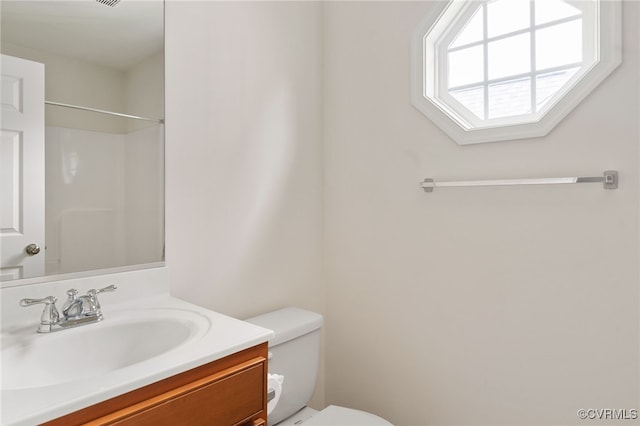 9533 Ashleyville Turn, Midlothian, VA 23112 - bathroom featuring vanity, toilet, and a shower