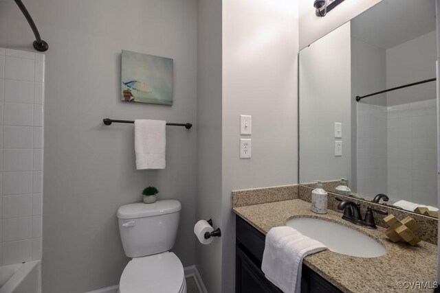 full bathroom with toilet, vanity, and bathtub / shower combination