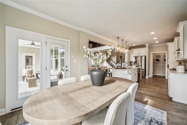 2710 Maidens Rd, Powhatan, VA 23139 - dining room with crown molding, recessed lighting, stairs, and dark wood-type flooring