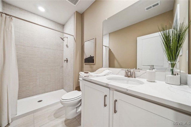 2710 Maidens Rd, Powhatan, VA 23139 - bathroom featuring visible vents, tile patterned flooring, vanity, toilet, and tiled shower