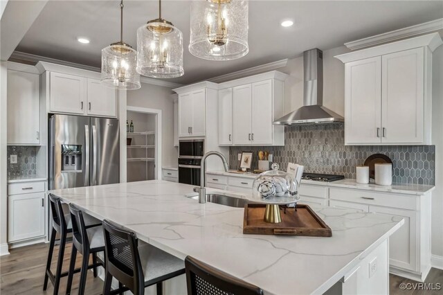 2710 Maidens Rd, Powhatan, VA 23139 - kitchen with wall chimney range hood, backsplash, a sink, ornamental molding, and stainless steel appliances