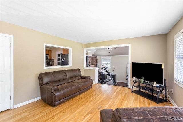 31 Warren Dr, Newport News, VA 23608 - living area with wood finished floors, baseboards, and a ceiling fan