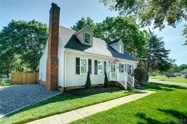 cape cod home featuring a chimney, crawl space, and a shingled roof