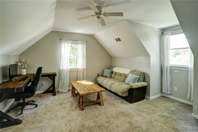 home office featuring a ceiling fan, carpet flooring, lofted ceiling, and baseboards