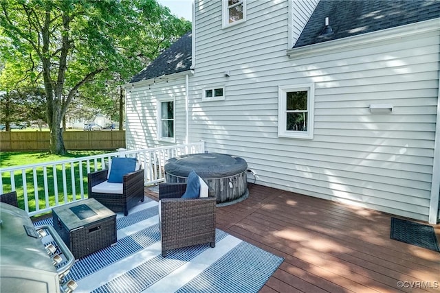 wooden deck featuring fence
