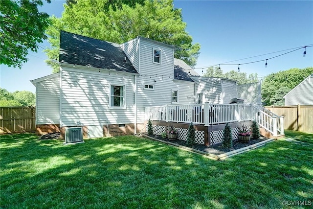 rear view of house with a deck, roof with shingles, cooling unit, and crawl space
