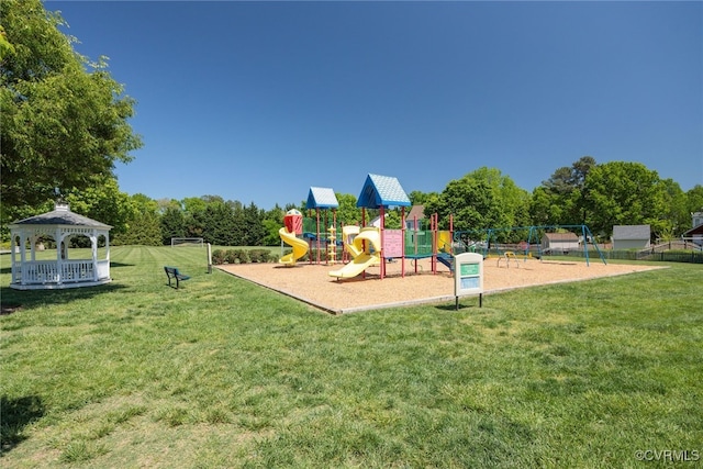 community jungle gym featuring a yard, a gazebo, and fence