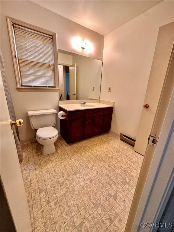 4805 Candlelight, Henrico, VA 23060 - half bathroom with vanity and a baseboard radiator