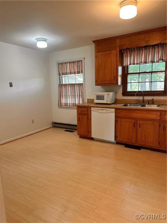 4805 Candlelight, Henrico, VA 23060 - kitchen with white appliances, brown cabinets, light countertops, and light wood finished floors