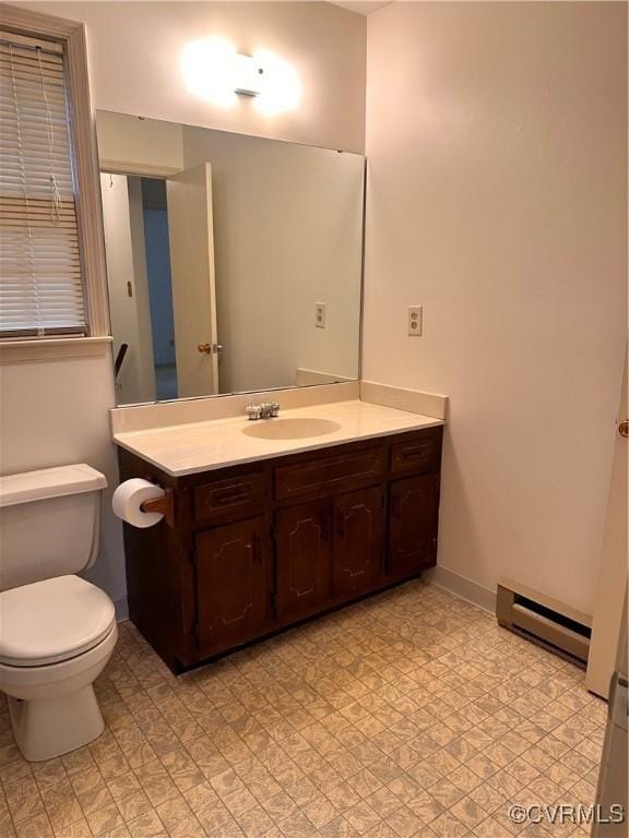 4805 Candlelight, Henrico, VA 23060 - bathroom featuring baseboard heating, vanity, and tile patterned floors