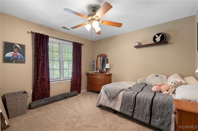 bedroom with visible vents, carpet, ceiling fan, and baseboards
