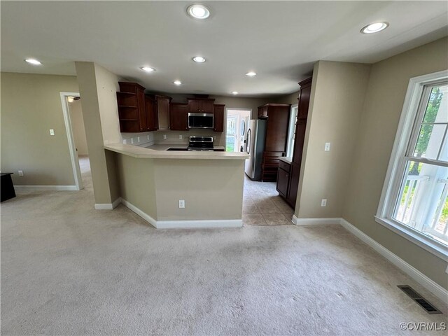 kitchen featuring visible vents, open shelves, light colored carpet, recessed lighting, and stainless steel appliances