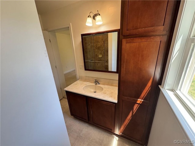 bathroom featuring vanity and tile patterned flooring