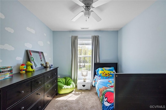 bedroom featuring ceiling fan, carpet flooring, and visible vents