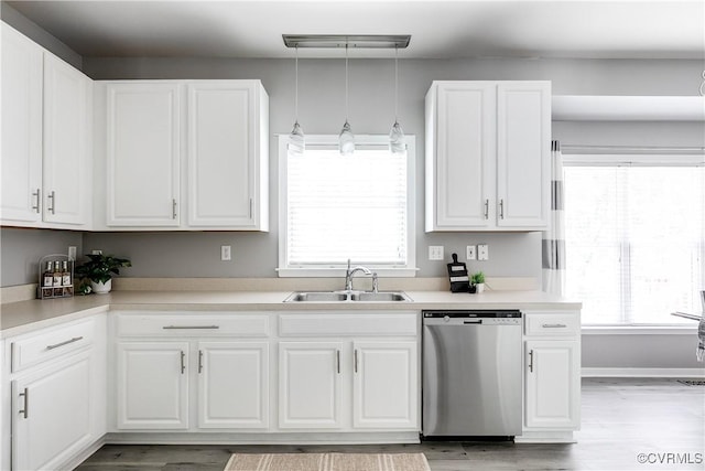 8134 Falling Leaf Ct, Mechanicsville, VA 23111 - kitchen with dishwasher, white cabinets, light wood-style floors, and light countertops
