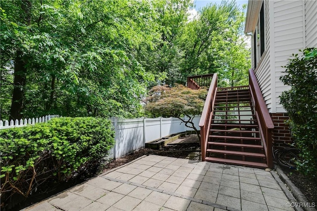 8134 Falling Leaf Ct, Mechanicsville, VA 23111 - fenced backyard with a patio area and stairway