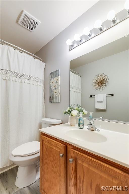 8134 Falling Leaf Ct, Mechanicsville, VA 23111 - full bathroom featuring vanity and wood finished floors
