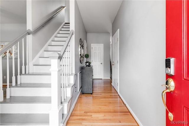 8134 Falling Leaf Ct, Mechanicsville, VA 23111 - staircase featuring wood finished floors