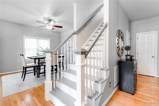 8134 Falling Leaf Ct, Mechanicsville, VA 23111 - stairs with ceiling fan and hardwood / wood-style flooring