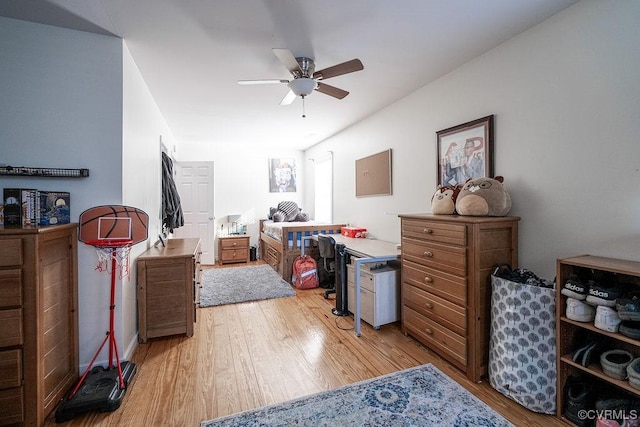 bedroom with ceiling fan and light wood-type flooring