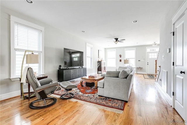 1207 N 21st St, Richmond, VA 23223 - living room featuring baseboards, a ceiling fan, light wood-style flooring, and recessed lighting