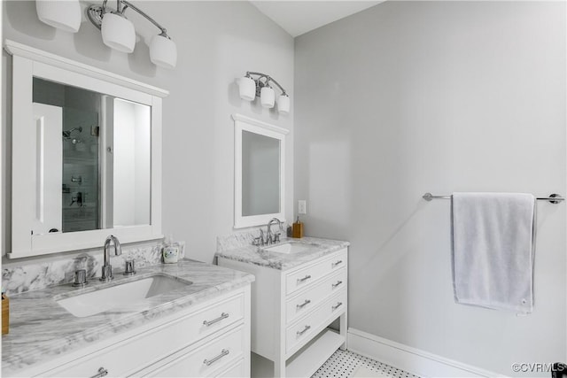 1207 N 21st St, Richmond, VA 23223 - bathroom with a sink, baseboards, a stall shower, and two vanities